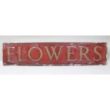 AN EARLY 20TH CENTURY CAST METAL "FLOWERS BREWERY" SIGN, having gilded letters on a red ground, 33cm