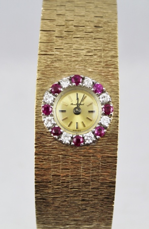 A LADY'S "BUECHE GIROD" 9CT GOLD INTEGRAL BRACELET WATCH, having bark textured bracelet, a bezel - Image 2 of 4