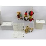 A COLLECTION OF FOUR STEIFF CHRISTMAS ORNAMENT BEARS, bearing dates, ear stud and white tags, two of