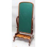 A VICTORIAN MAHOGANY FRAMED CHEVAL MIRROR, having arched top plate, the stand with "S" scroll