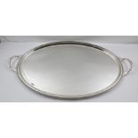 A "ROMNEY" SHEFFIELD SILVER PLATED OVAL TEA TRAY with beaded edge, fitted two carrying handles, tray