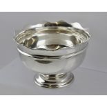 PROBABLY CHARLES EDWARDS A SILVER PEDESTAL ROSE BOWL having applied wavy bead wire rim, plain