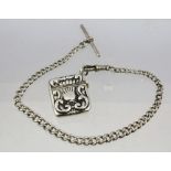 A SILVER COLOURED METAL HALF ALBERT CHAIN with dog clip and toggle and a VESTA CASE