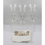 A SET OF THREE 20TH CENTURY GEORGIAN DESIGN WINE GLASSES with trumpet bowls, knopped stems and domed