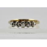 AN 18CT GOLD AND PLATINUM FIVE STONE DIAMOND RING, stamped 18ct and plat. to shank, size P