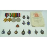 A COLLECTION OF ELEVEN SILVER AND ENAMEL SPORTING FOBS FROM THE 1920'S, includes "Chorlton and Dist.