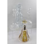 A LATE VICTORIAN BOHEMIAN PEAR FORM DECANTER, having alternate amber panels cut with floral