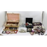 A LARGE QUANTITY OF COSTUME JEWELLERY to include necklaces, rings, brooches etc.