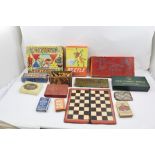 A LARGE COLLECTION OF VINTAGE GAMES to include; a boxed chess set and board, 2 Waddingtons Bezique