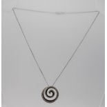 AN 18CT WHITE GOLD AND DIAMOND "SWIRL" DESIGN NECKLACE stamped 750, on chain