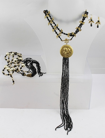 TWO FLAPPER NECKLACES, one with pair of matching earrings