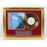 A LIMITED EDITION COLLECTOR'S ITEM RELATING TO "ROD STEWART", A FRAMED "... 24 CARAT GOLD PLATED