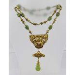 AN EGYPTIAN REVIVAL NECKLACE made in Czechoslovakia, possibly Max Neiger, the bead chain approx 70cm