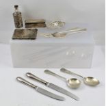A QUANTITY OF ASSORTED SILVER ITEMS including; a decorative card case, a hinged lidded box, a pin
