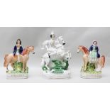 A PAIR OF VICTORIAN STAFFORDSHIRE POTTERY FIGURES ON HORSE BACK, "Gipsy Boy" and "Gipsy Girl",