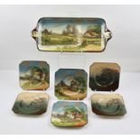 A ROYAL DOULTON POTTERY SANDWICH SET comprising a serving tray with landscape cottage designs and