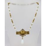 A WINGED SCARAB NECKLACE having faceted opaline beads and a plain pendant drop, bolt ring clasp