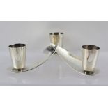 A LATE 20TH CENTURY DANISH SILVER PLATED THREE-SCONCE CANDLE HOLDER of propeller form, 14cm across