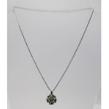 A 14CT WHITE GOLD EMERALD CLUSTER PENDANT, having six twisted gold sections each with single emerald