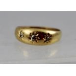 AN EDWARDIAN 18CT GOLD SET DIAMOND THREE-STONE GYPSY SET DRESS RING, Chester 1902, size R 1/2, 5g.