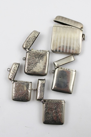 A COLLECTION OF FIVE HALLMARKED SILVER VESTA CASES, includes plain and chased, overall weight 116g.