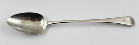 THOMAS WILKES BARKER A GEORGE III SILVER BASTING SPOON having engraved crest, London 1813, 30cm