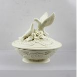 A LATE VICTORIAN GLAZED PARIAN BOWL AND COVER in the manner of Belleek, the cover decorated with