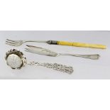 A VICTORIAN SILVER SUGAR SIFTING SPOON with pierced and engraved handle, Birmingham 1895 30g
