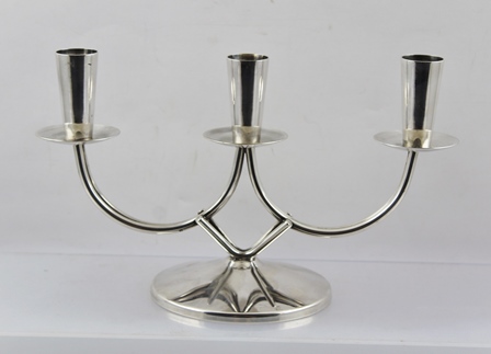 A "BERG" DANISH SILVER PLATED TABLE CANDELABRA of three sconce design, on a wire frame and
