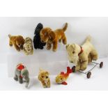 A COLLECTION OF EIGHT STEIFF ANIMALS, to include tiger, goldfish, elephant, dogs (8)