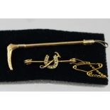 TWO VICTORIAN GOLD HUNTING THEMED BAR BROOCHES, one fashioned with a pearl set horseshoe and