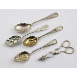 A PAIR OF VICTORIAN SILVER SUGAR NIPS 1862 together with FOUR VARIOUS DECORATIVE JAM SPOONS (one