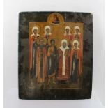 LATE 19TH CENTURY RUSSIAN SCHOOL A Portrait Icon of eight standing under God on high, Oil on pine