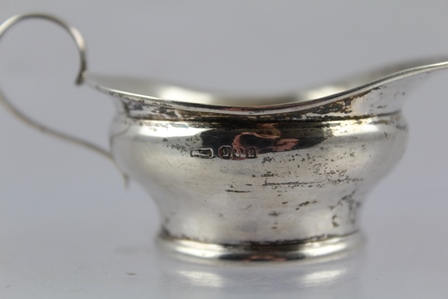 TWO SMALL SILVER MINT SAUCE JUGS, one plain Dublin 1912, the other of fluted Georgian design with - Image 3 of 3
