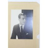 A PORTRAIT PHOTOGRAPH OF A YOUNG GENTLEMAN, inscribed and dated 1938, signed Beaton (Cecil Beaton)