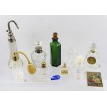 A COLLECTION OF SCENT BOTTLES including one with a silver collar and one in the form of an umbrella