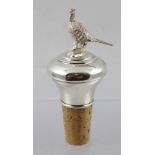 AN EARLY 21ST CENTURY SILVER MOUNTED CORK BOTTLE STOPPER with a cast pheasant knop, Birmingham 2004,