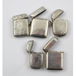 A COLLECTION OF FIVE HALLMARKED SILVER VESTA CASES, includes plain and chased, overall weight 138g.