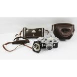 A LEICA M3 35mm FILM CAMERA, with Leitz Wetzlar lens and light meter, camera bears no. 1071700, in