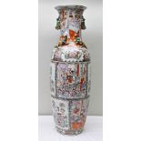 A LARGE 20TH CENTURY CHINESE VASE of elongated baluster form, enamelled decoration of courtly scenes