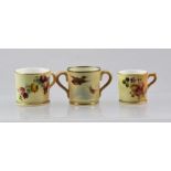 TWO ROYAL WORCESTER MINIATURE PORCELAIN TANKARDS, blush apricot ground with hand painted floral