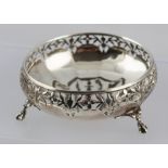 AN ADIE BROTHERS SWEETMEAT DISH having pierced rim, raised upon three cast ball and claw feet,