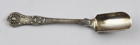 WILLIAM EATON AN EARLY VICTORIAN SILVER STILTON SCOOP having shell cast handle engraved with a