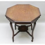 AN EDWARDIAN MAHOGANY OCTAGONAL CENTRE/HALL TABLE, having inlaid decoration, raised on shaped