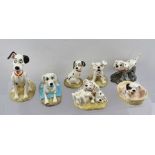 A COLLECTION OF SEVEN ROYAL DOULTON HAND-MADE AND DECORATED FIGURES OF DISNEY'S "101 DALMATIANS"