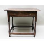 AN 18TH CENTURY OAK PLANK TOP SIDE TABLE, fitted single drawer with brass handles, on turned