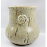 A RUSKIN HIGH FIRED VASE with three Tudor Rose rosettes modelled to the neck over a bulbous body, in