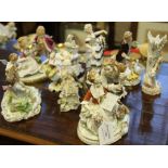 A group of 10 assorted continental figure ornaments.