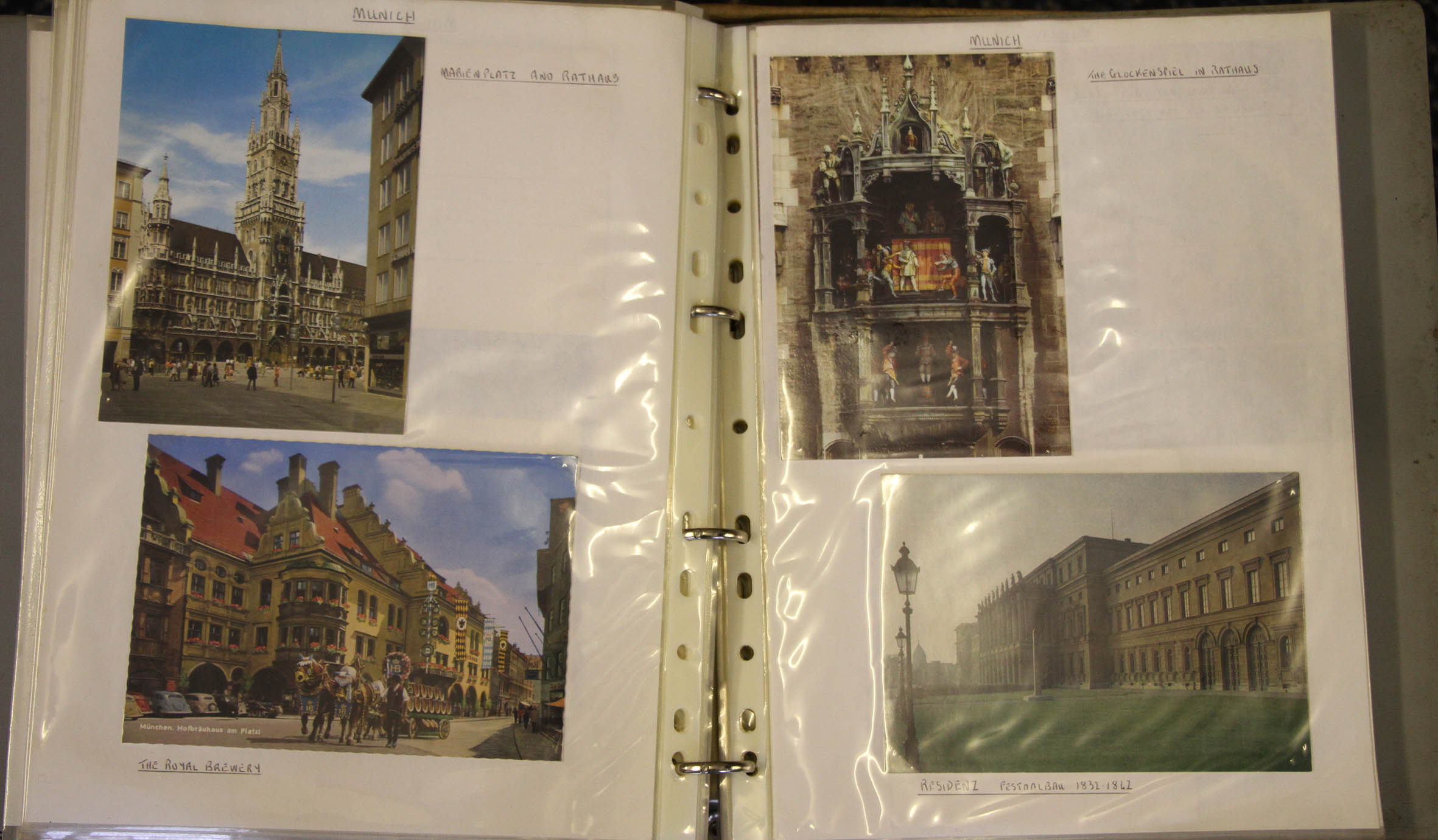 A box of four albums containing photographs and picture postcards. - Image 3 of 3