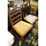 Two 19th Century oak chairs, one with waved ladder back.